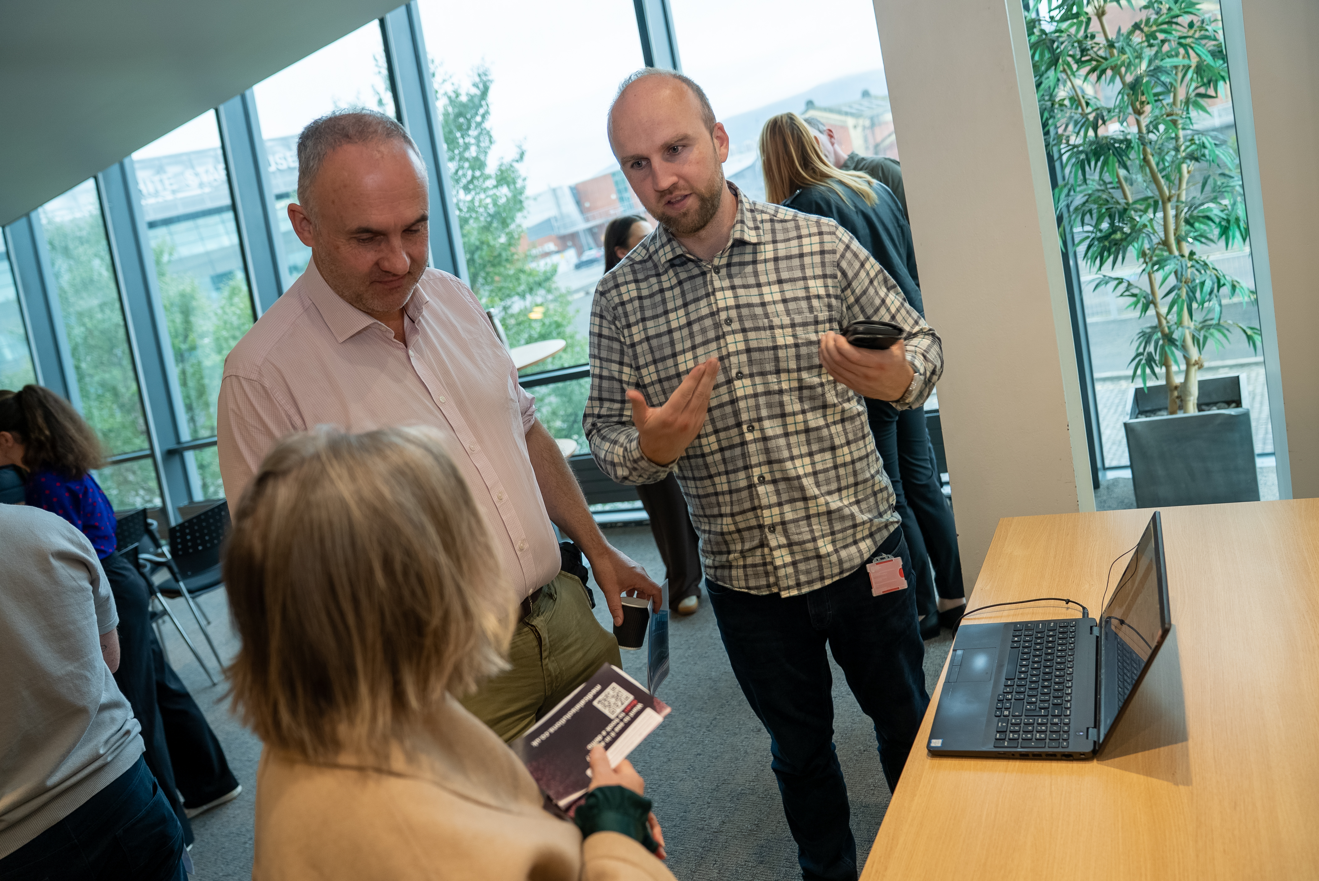 catering staff smiling and getting ready to serve at Winter graduation 2023