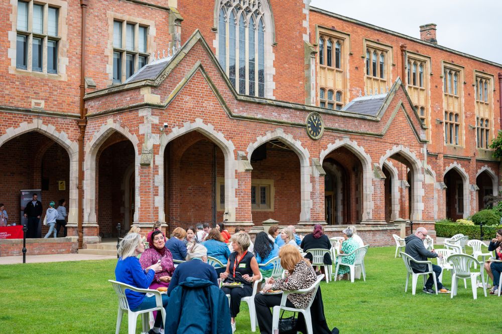 Staff carers enjoying a barbecue on Queen's quadrangle