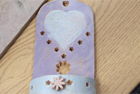 Pink and white clay wall candle creation