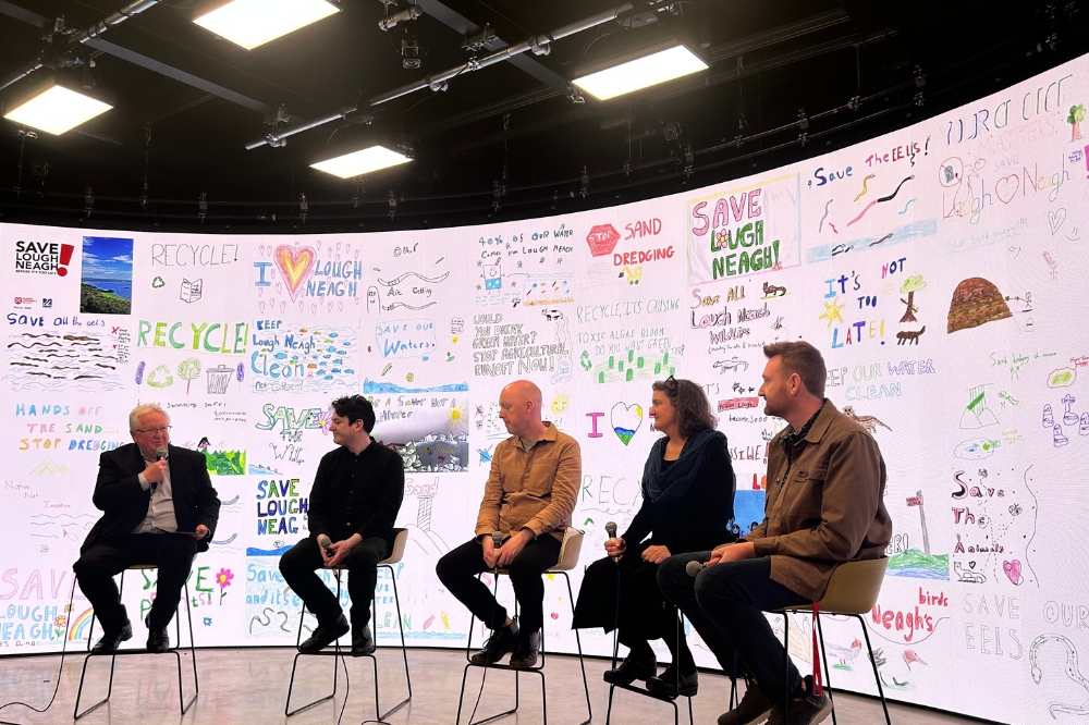 A group of panellists at the Reach'25 Festival engaged in discussion