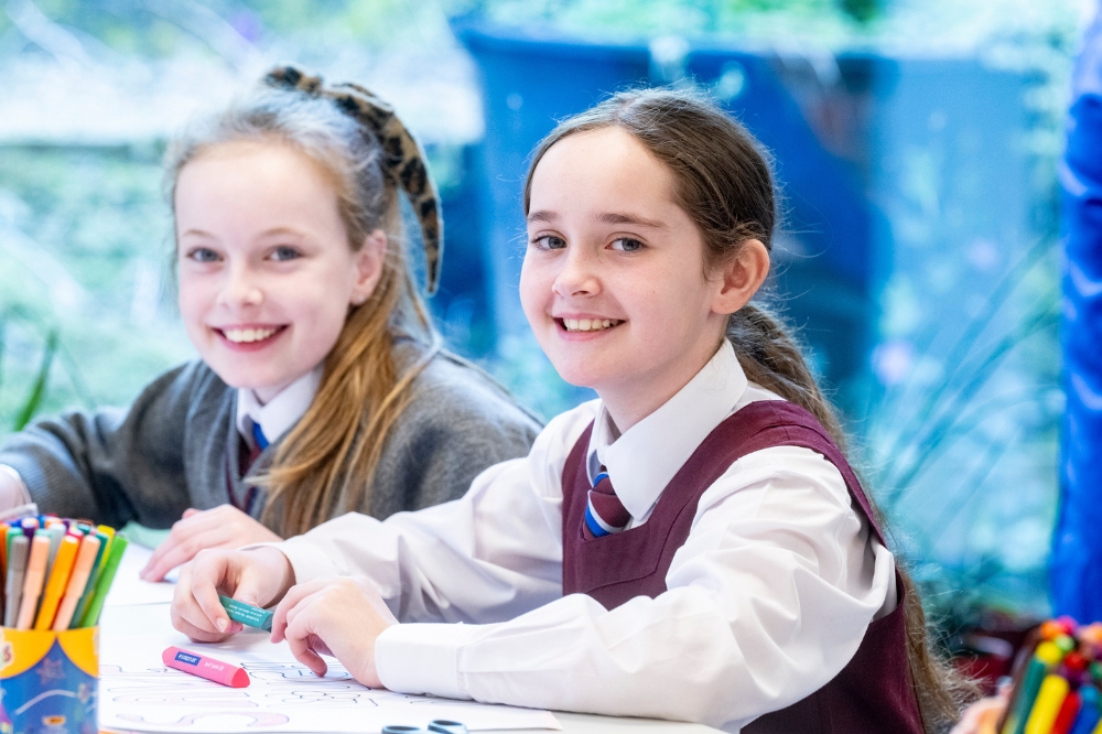 Smiling and enthusiastic girl at the Reach'25 Workshop