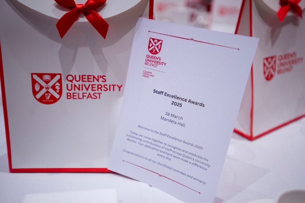 Queen's University Belfast table setting including food menu for Staff Excellence Awards 2023-24